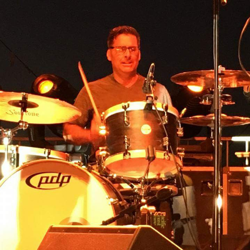Pete Buotte is a senior construction administrator who also plays drums
